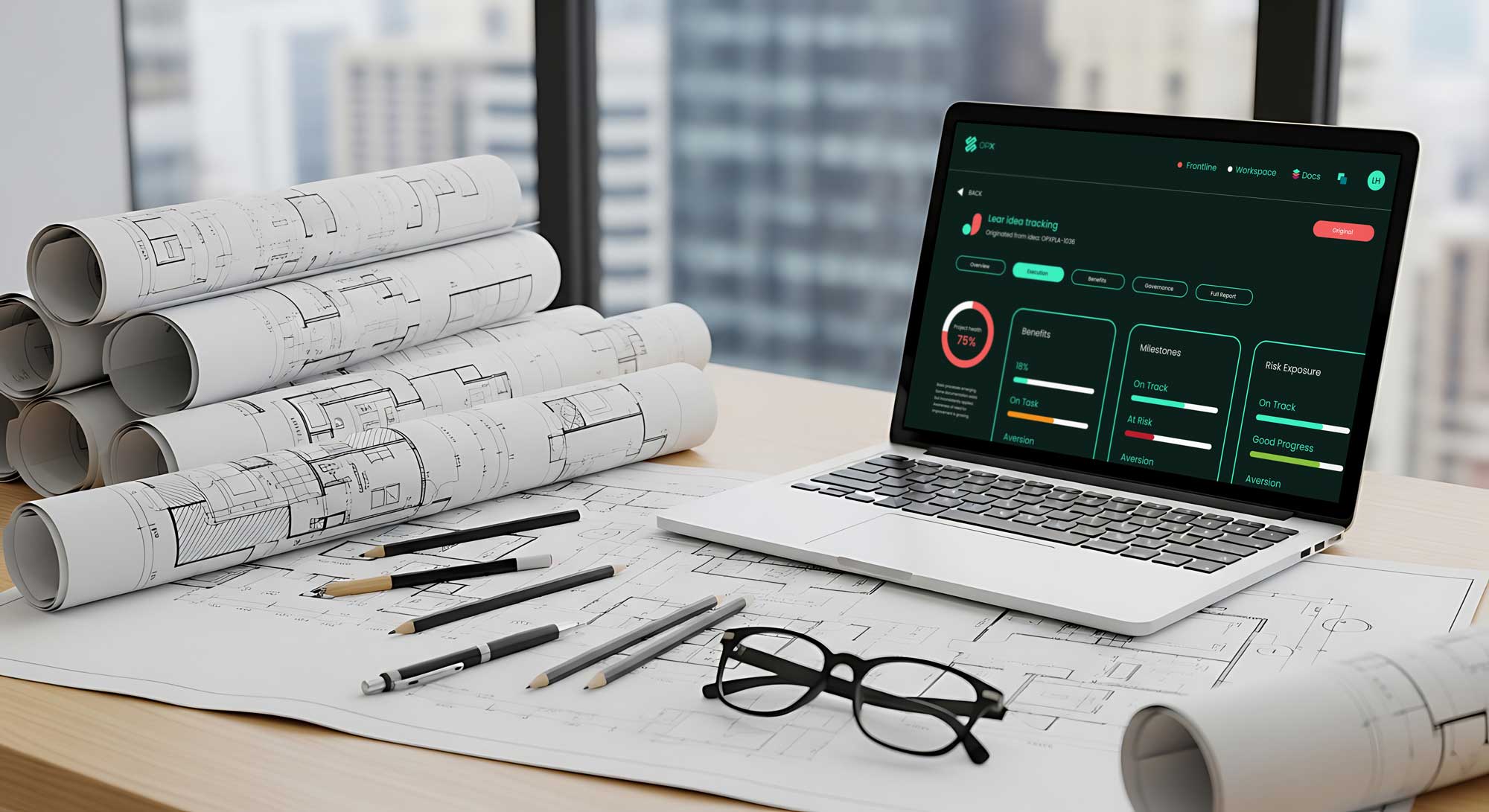 OpX platform dashboard on a laptop surrounded by architectural blueprints